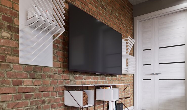 Tivi được lắp đặt lên tường một cách đẹp mắt bởi giá treo tivi sát tường